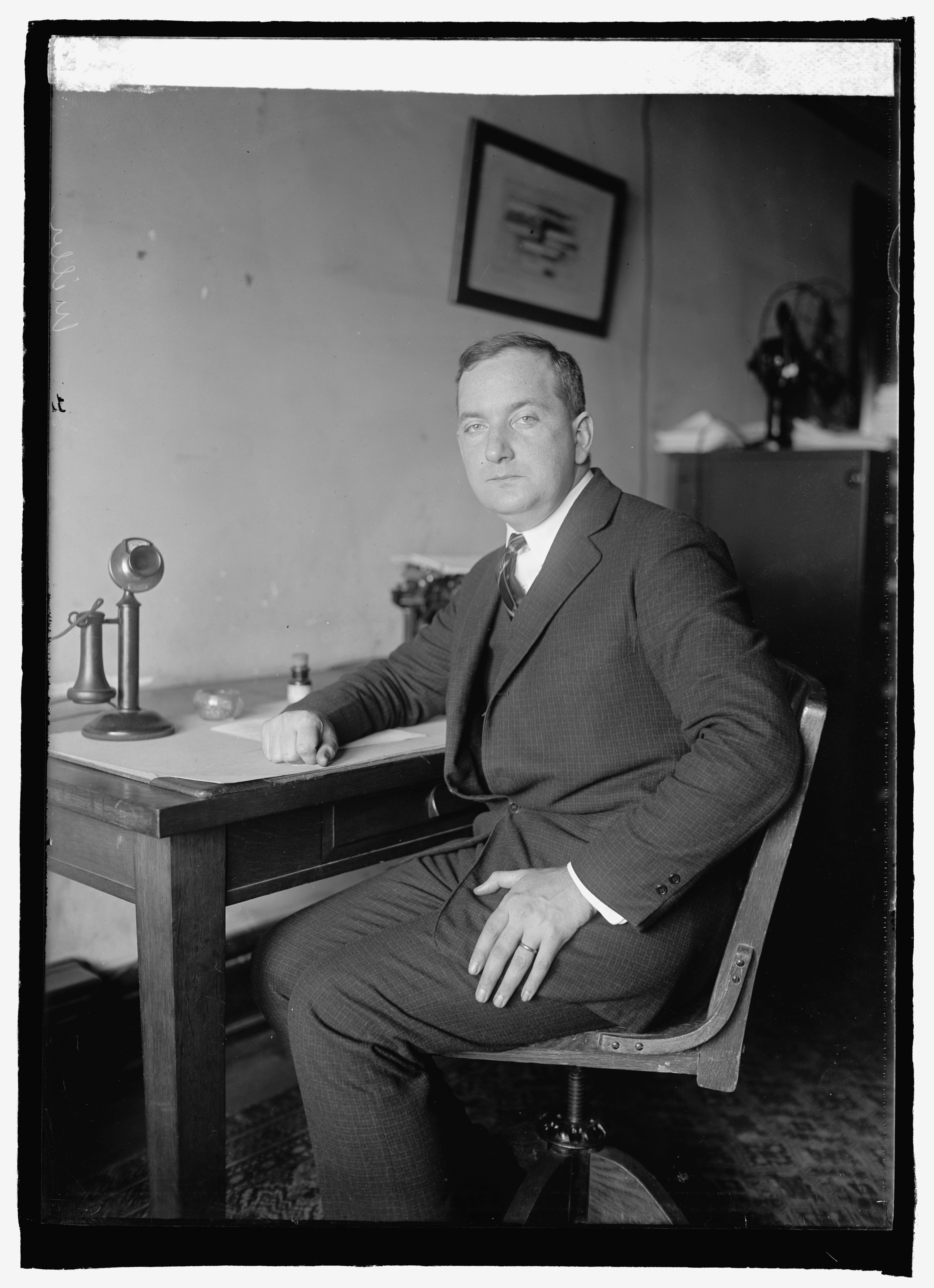 Yankee diplomat Douglas P. Miller sitting in an office in 1924.