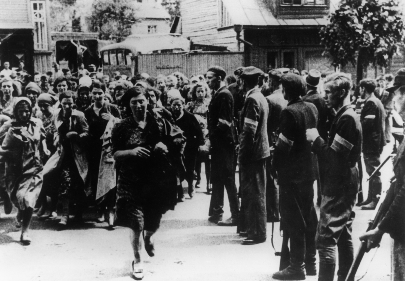 Jewish women being rounded up in Kowno (Kaunas) overseen by armed members of the Lithuanian Activist Front, 1941