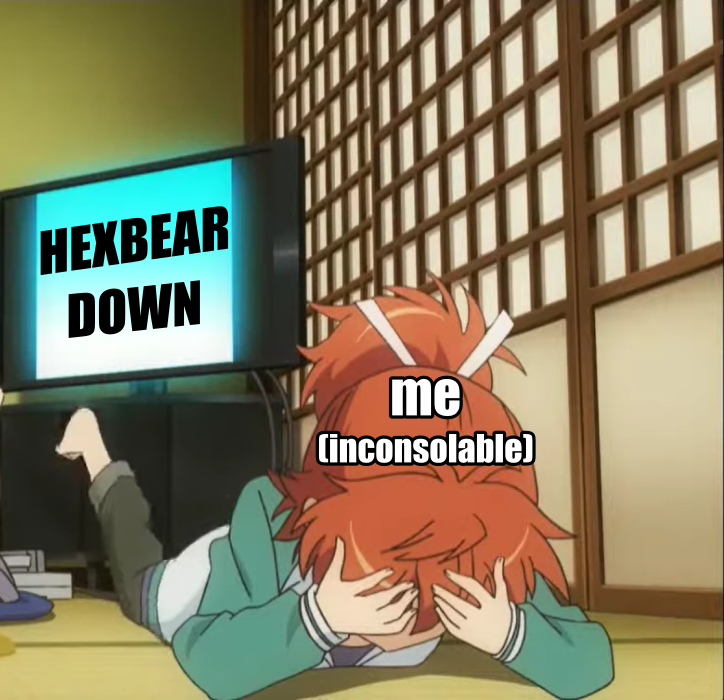 Natsumi Koshigaya crying on the floor, her head in her hands and her legs kicking, labeled "me, inconsolable", afront a TV screen with the words "HEXBEAR DOWN"