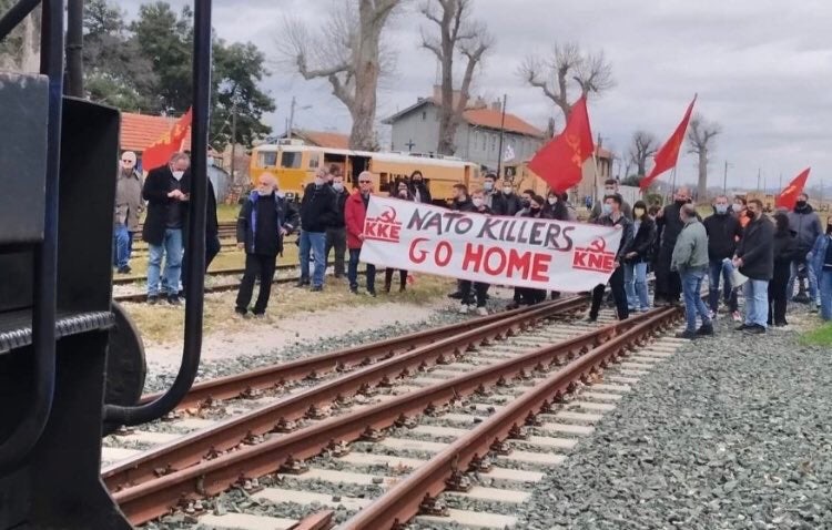 Members of the Communist Party of Greece and the Communist Youth blocking a shipment of US and NATO military equipment and vehicles arriving to the Port of Alexandroupolis.