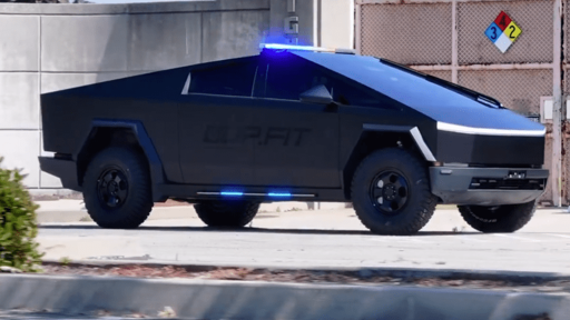 The ugliest car possible (a cybertruck) somehow made worse by adding police lights and a tacti-cool dark tinted and wrap job.