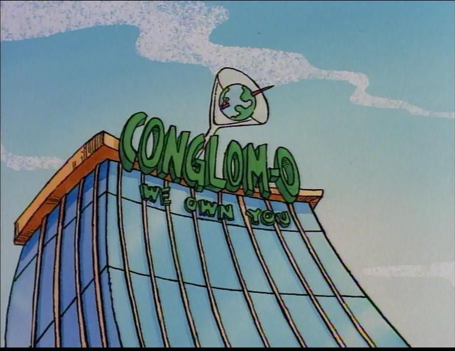 Screenshot from Rocko’s Modern Life of the building of the corporation Conglom-o, with their motto, “We own you”