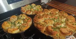 Homemade cast iron chicken pot pies with garlic butter biscuits