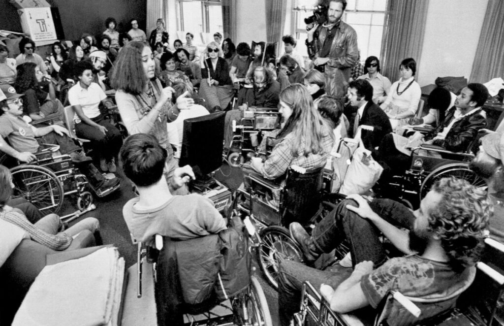 Dozens of disabled demonstrators gathered inside the HEW building in San Francisco, 1977.