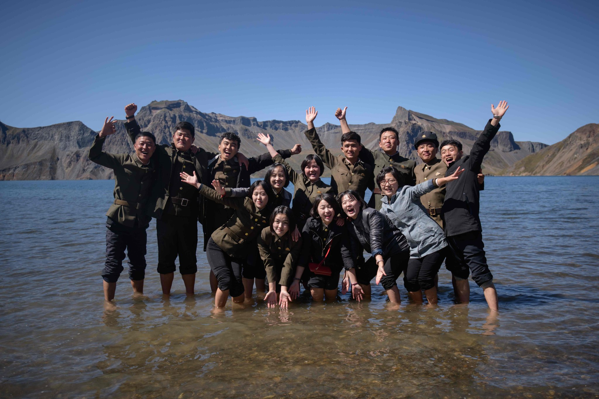 North Korean students strike a fun pose at Mt. Paektu