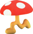 a red mushroom with legs